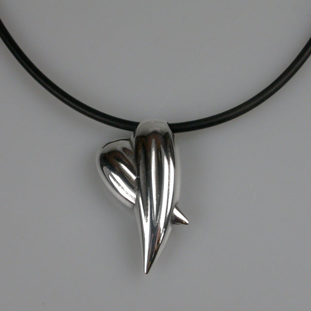 Bespoke True Blood inspired fang pendants custom made for the cast of HBO's hit vampire series.